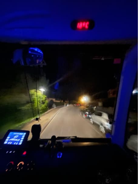 Driving a dark road at night