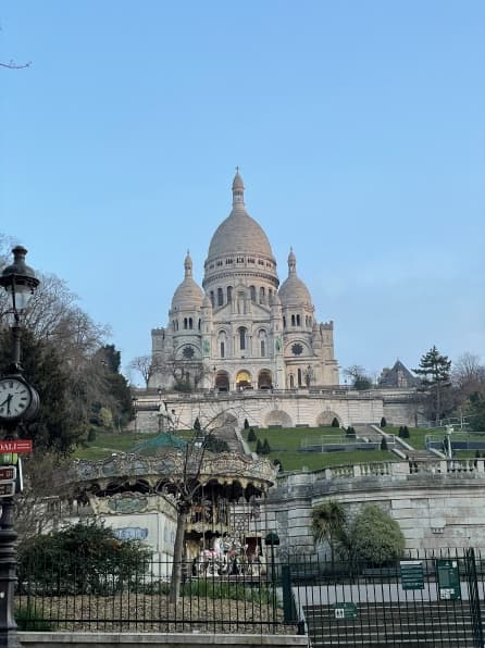 The Sacré-Cœur in Paris under a blue sky