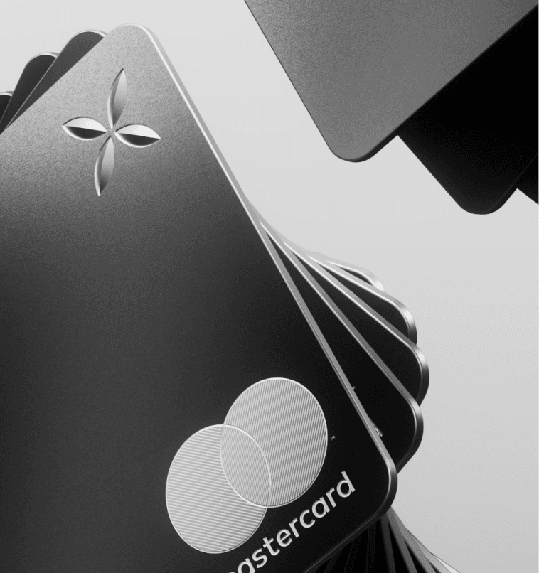 Black Qonto Mastercard cards fanned out